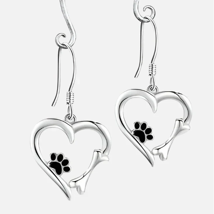 Silver dangling earrings with heart and paw print motif
